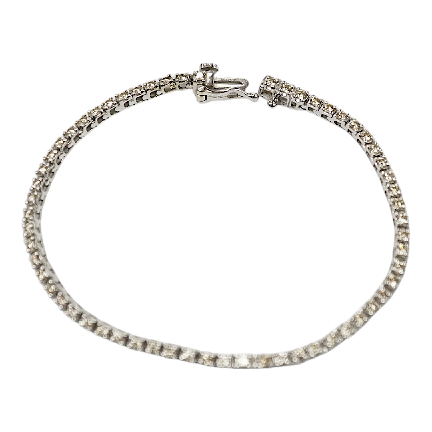 A modern 9ct white metal and diamond set tennis bracelet, with a total diamond weight of 1.50ct, 17.3cm, gross weight 6.6 grams. Condition - good